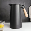 NordicTherm – Insulated Carafe with Wooden Handle for Stylish Enjoyment