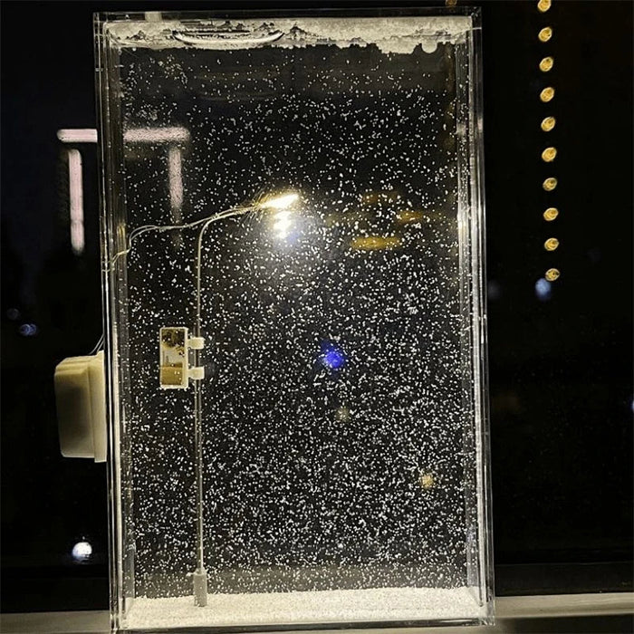 WinterGlow – LED street lamp with magical snow effect decoration